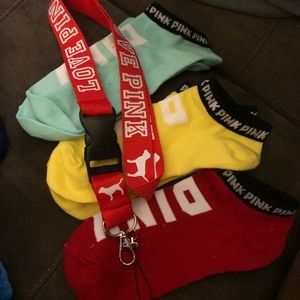 Victoria secret PINK socks and a lanyard